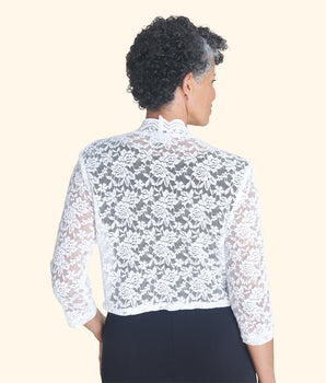 Woman posing wearing White Talula Scalloped Lace White Shrug from Connected Apparel